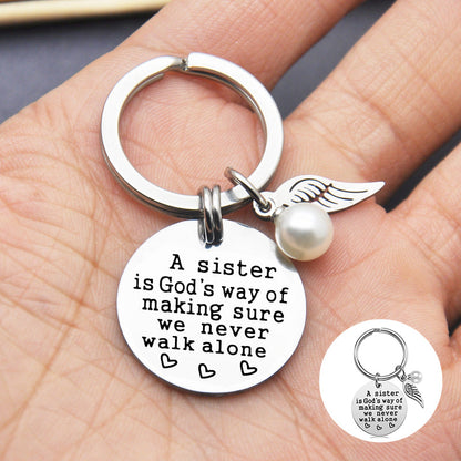 A Sister is God's Way of Making Sure We Never Walk Alone Keychain